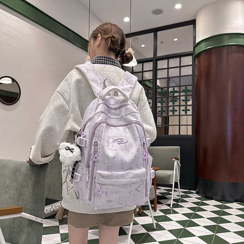 The new summer tie-dyed artistic Chinese-style schoolbag has a high appearance level. It is a light and refreshing travel backpack for young girls with a forest style details Picture