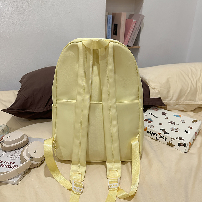 A new high-appearure-level Japanese ins rainbow graffiti backpack for junior and senior high school students, a casual, lightweight and large-capacity backpack Specification drawing