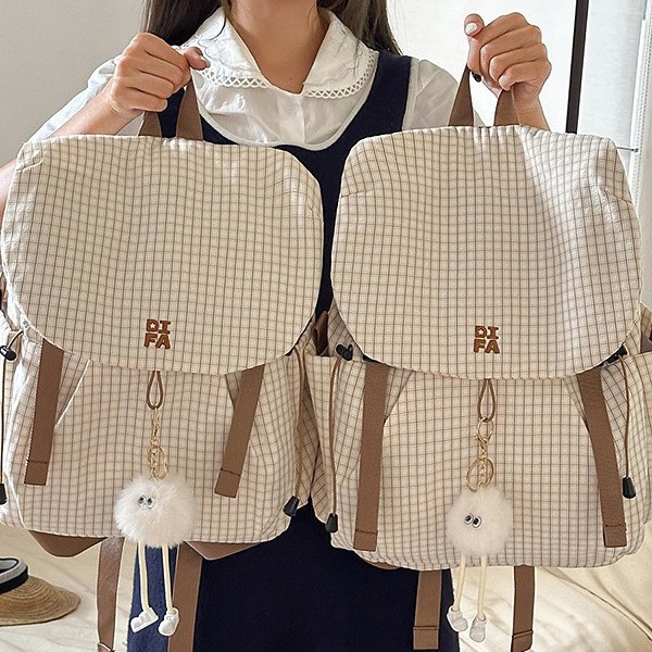 A new high-appearance-level forest-themed ins fresh and sweet backpack for junior and senior high school students, a large-capacity backpack for light travel details Picture