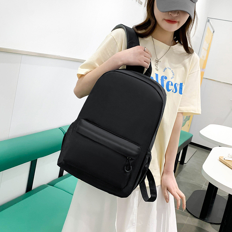 The schoolbag can be customized as a simple and solid-color LOGO backpack for primary school students, a large-capacity advertising backpack for outdoor leisure for both men and women full figure