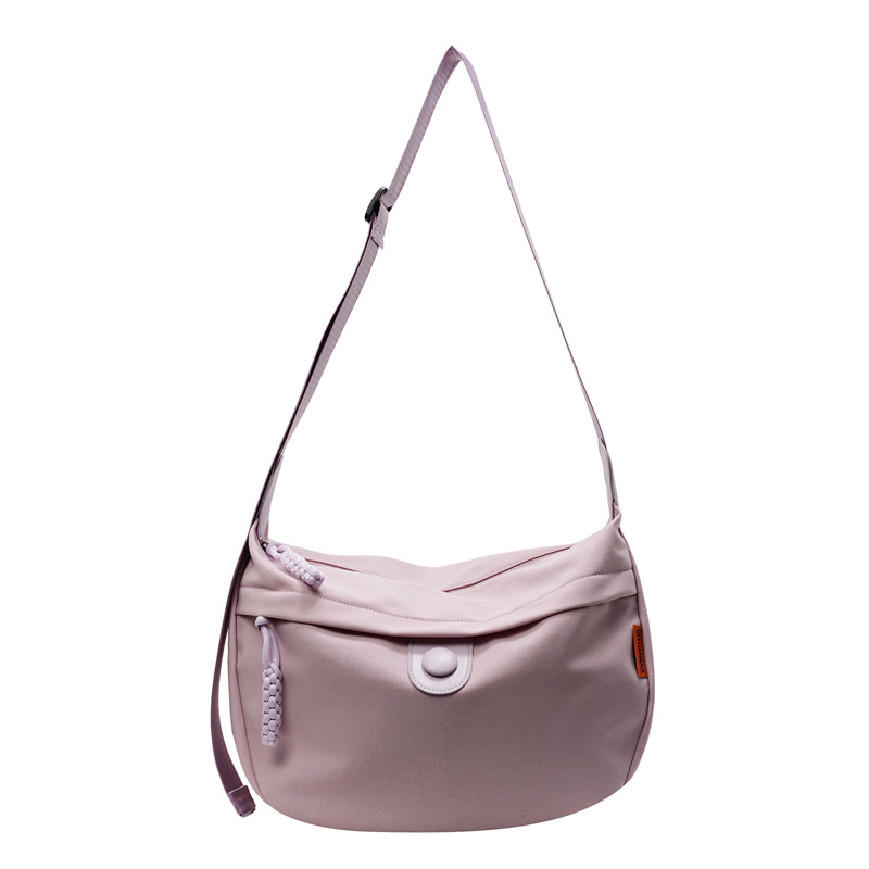 The pure color Youth Dumpling Bag 2025 new model is a lightweight and simple commuting single-shoulder crossbody bag with a high level of appearance Item Picture