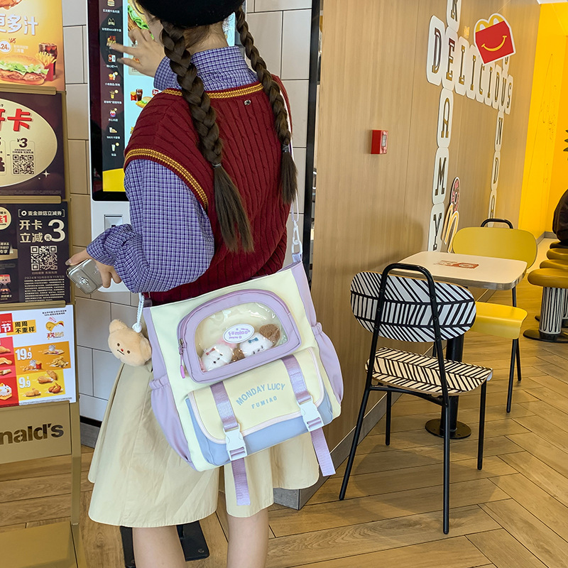 Cute color-blocking hand-held shoulder bag, large-capacity crossbody bag, a casual commuting bag for female college students attending classes, and a make-up class bag details Picture