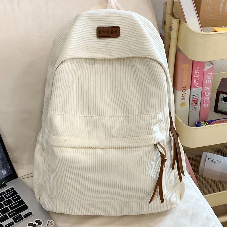 New autumn and winter corduroy backpack, a fashionable new Korean-style backpack, a lightweight and versatile bag for both boys and girls full figure