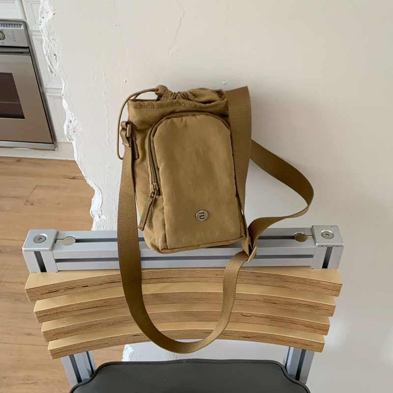 New high-appeartion-level outdoor sports commuting phone bag, bucket bag, niche casual, simple, lightweight and versatile crossbody bag Specification drawing