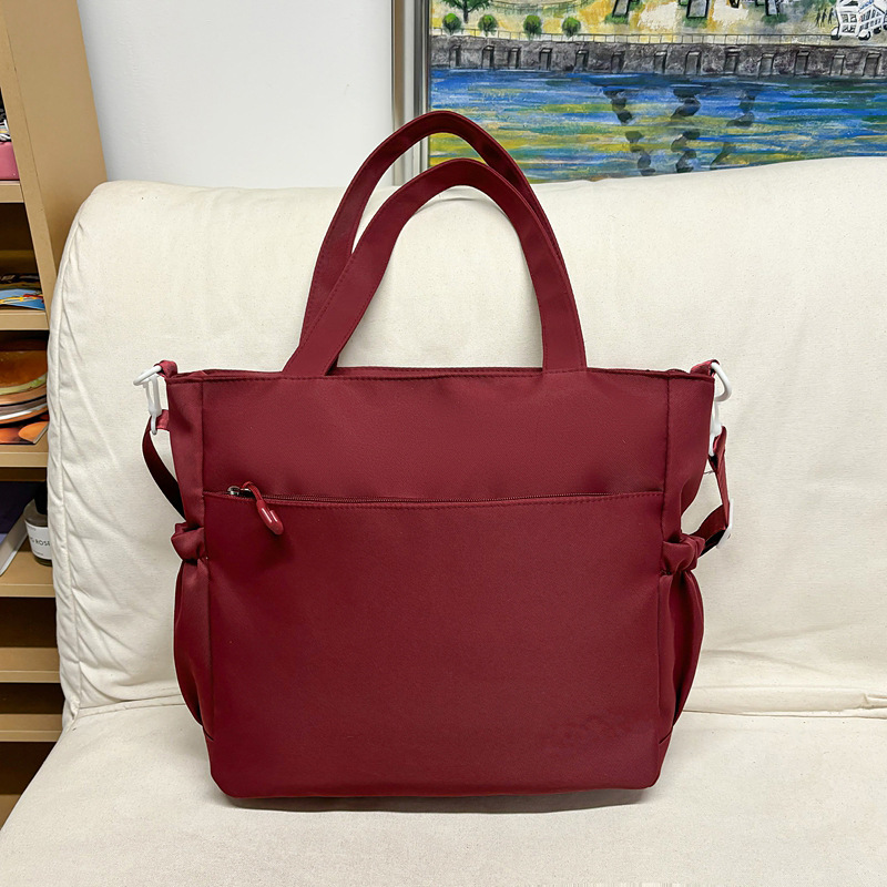 A large-capacity crossbody bag with a contrasting color and niche design, a Korean-style Instagram single-shoulder tote bag for girls, and a student tutorial class bag Specification drawing