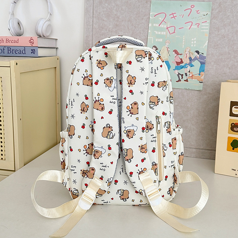 The 2025 new large-capacity multi-compartment printed cartoon cute schoolbag for grades one to three is a versatile and lightweight backpack Specification drawing
