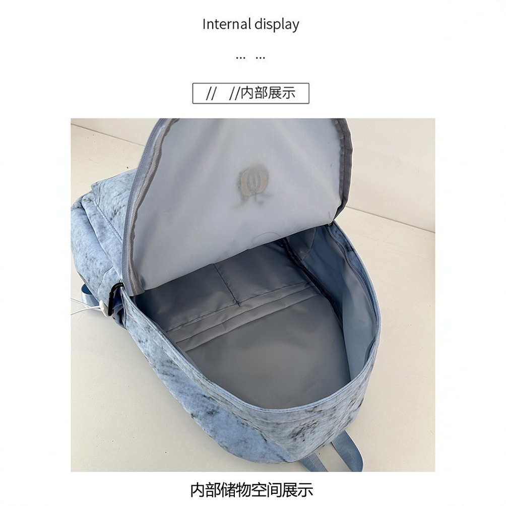 2025 New style of large-capacity, fashionable, solid-color, simple and versatile schoolbag for women on Instagram, a travel backpack for junior and senior high school students Application Scenario