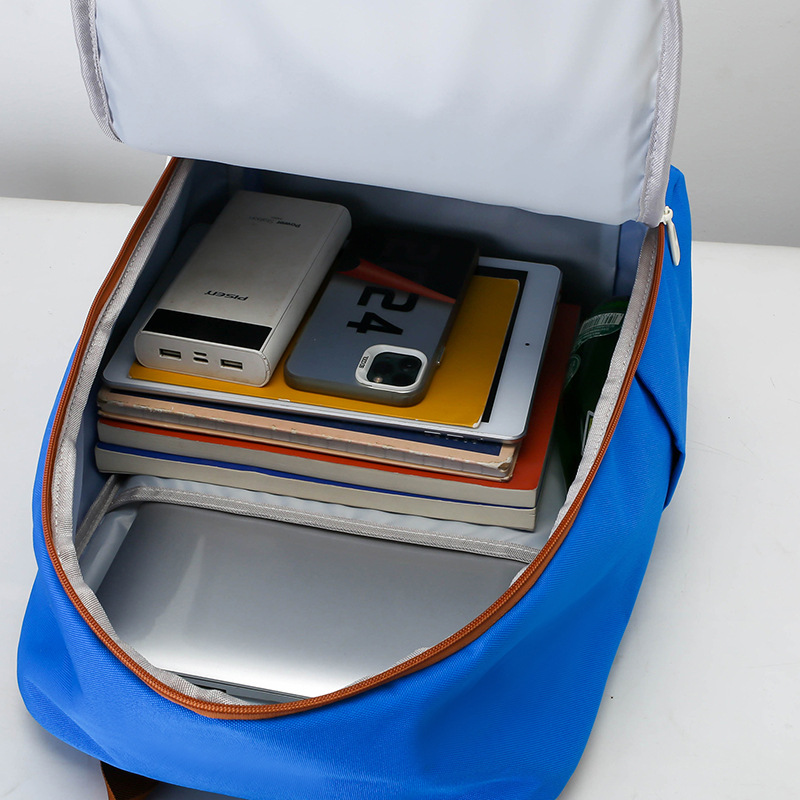 2025 New large-capacity children's hand-held tutorial bag, versatile, lightweight, waterproof backpack, casual training book bag Application Scenario