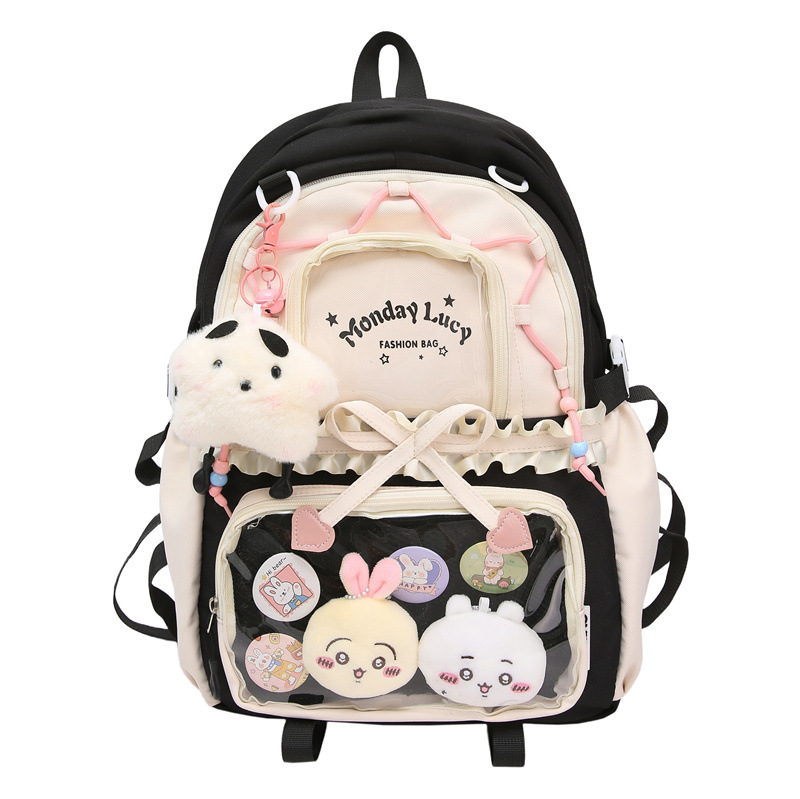 The new schoolbag features a contrasting color scheme for girls' high school students, a college-style backpack for junior and senior high school students, and a ballet-style pleated lace pain bag Item Picture