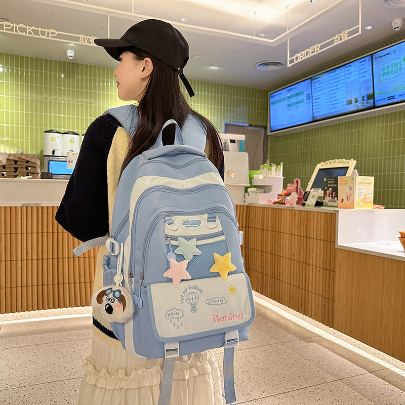A new high-appearancy-level multi-layer fresh and light backpack for junior and senior high school students, sweet and versatile, with color-blocking embroidery and lightweight backpacks full figure