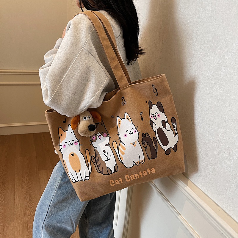 Spring 2025 new ins laid-back style large-capacity canvas bag, versatile single-shoulder student artistic cartoon tote bag details Picture