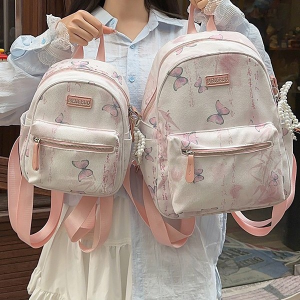 A new high-appearance-level national trend ins ancient style fresh and sweet backpack for primary and secondary school students, a lightweight and large-capacity backpack details Picture