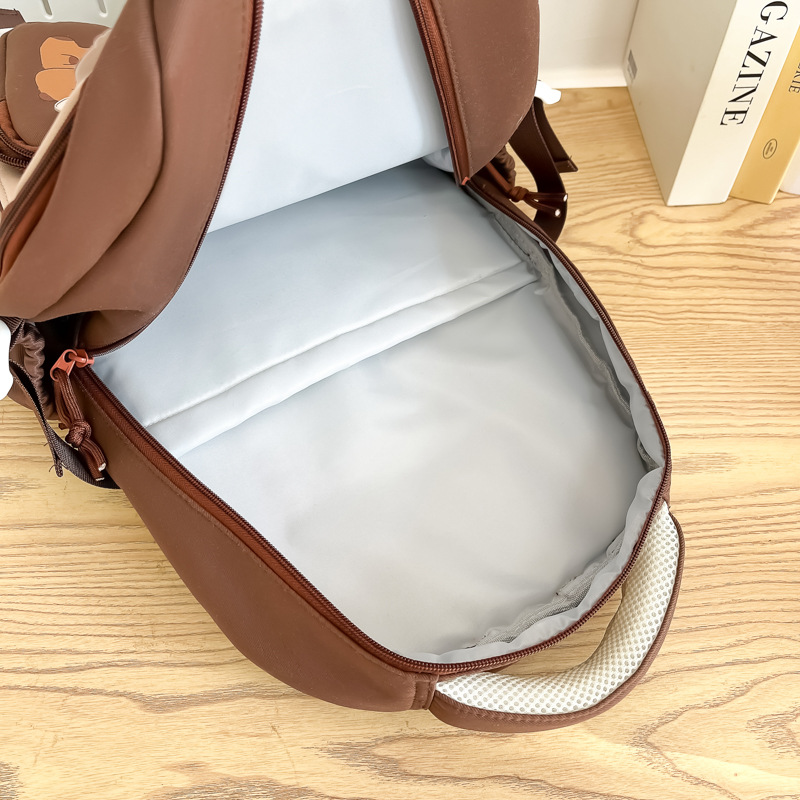 2025 New casual and versatile school-style large-capacity backpack for junior and senior high school students, waterproof printed, high appearance level backpack Specification drawing