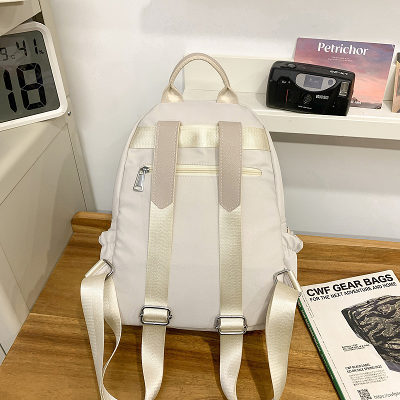 Solid-colored female college student's simple travel backpack, lightweight small backpack, leisure travel bag, travel bag, study bag Specification drawing