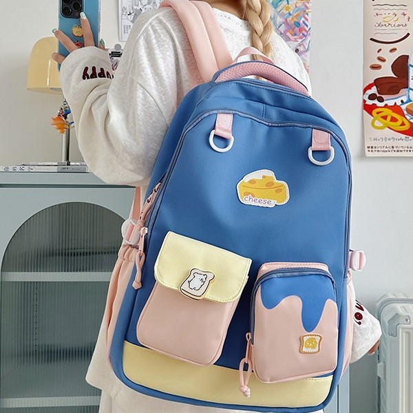 A new Japanese-style backpack with a high level of appearance, fresh and sweet dopamine, and a large-capacity backpack for junior and senior high school students with color blocking and splicing full figure