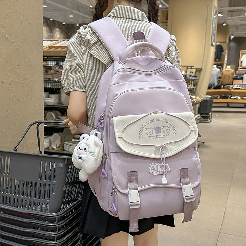 A new high-appearance-level Korean ins fresh and sweet macaron-colored backpack, a simple and lightweight backpack for middle and high school students full figure