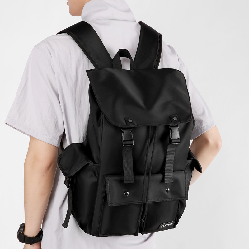 A new high-appearation-level solid color simple sports backpack storage bag for men, a lightweight travel and mountaineering large-capacity backpack full figure
