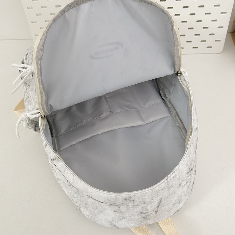 Simple tie-dyed schoolbag for college students, niche and versatile backpack, large-capacity Japanese-style backpack, casual travel single-shoulder bag Application Scenario