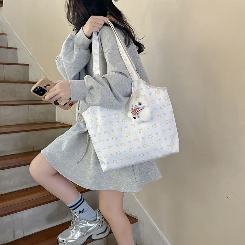 2025 New cute single-shoulder bag for girls, ins fashionable tote bag for women's commuting, fresh and large-capacity handbag details Picture