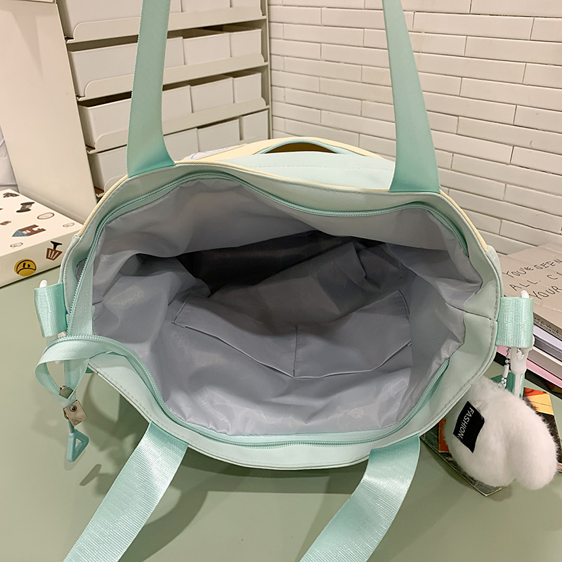A new Japanese-style ins school style, fresh and sweet, color-blocking and patchwork tutorial bag for women, a lightweight tutorial travel crossbody bag Application Scenario