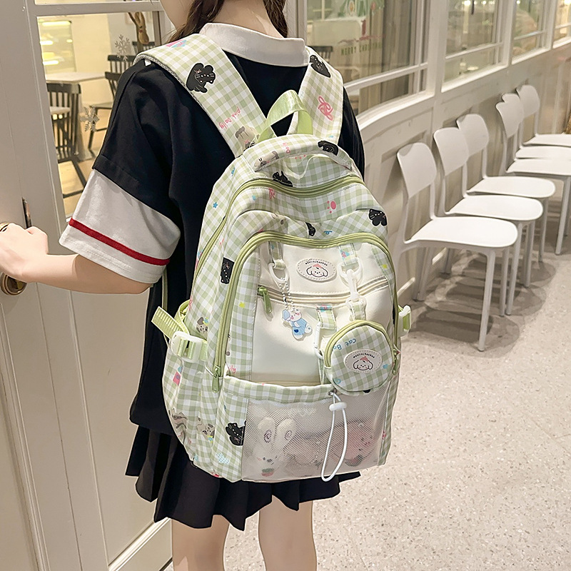 Japanese-style Instagram fresh, sweet and cute 2D checkered backpack, a large-capacity backpack with contrasting colors for junior and senior high school students full figure