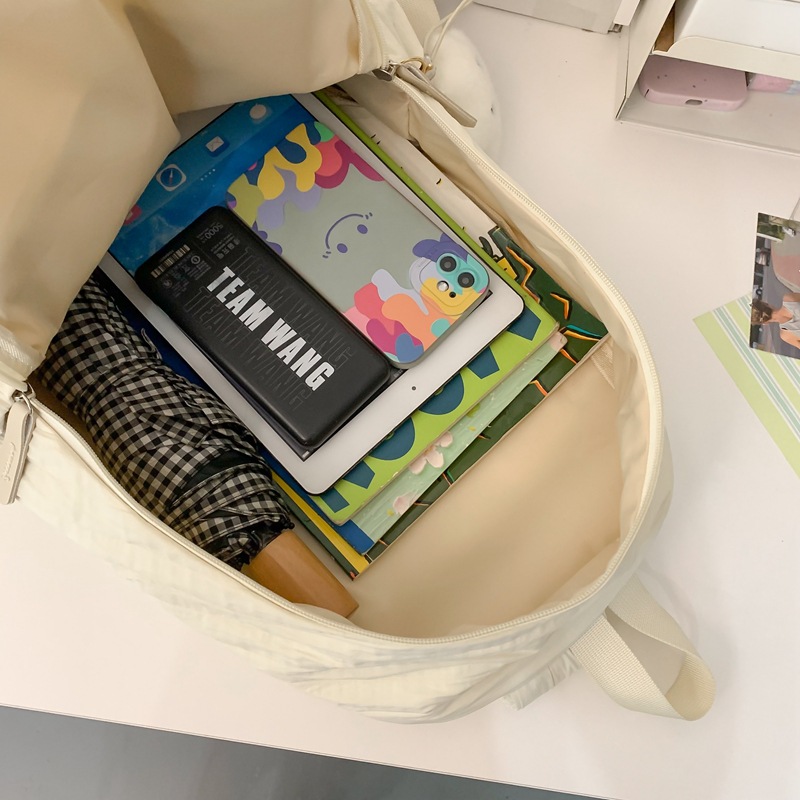 Forest-themed junior high school girl schoolbag, solid color, versatile, large-capacity backpack, fresh and light travel backpack Application Scenario