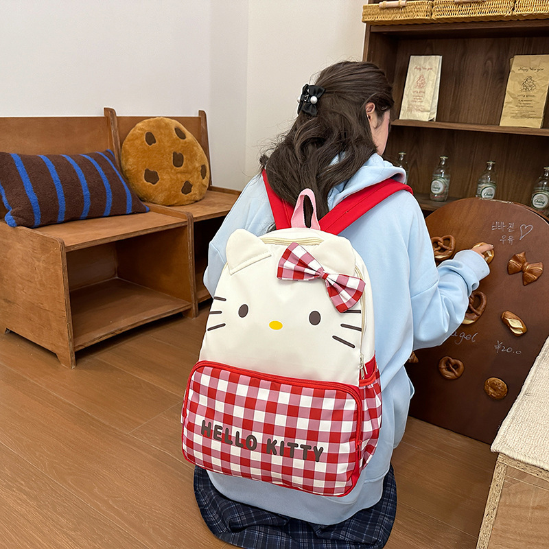 Sweet bow milk tea-colored backpack, large capacity, versatile, cute cartoon schoolbag, Japanese-style casual and lightweight backpack full figure