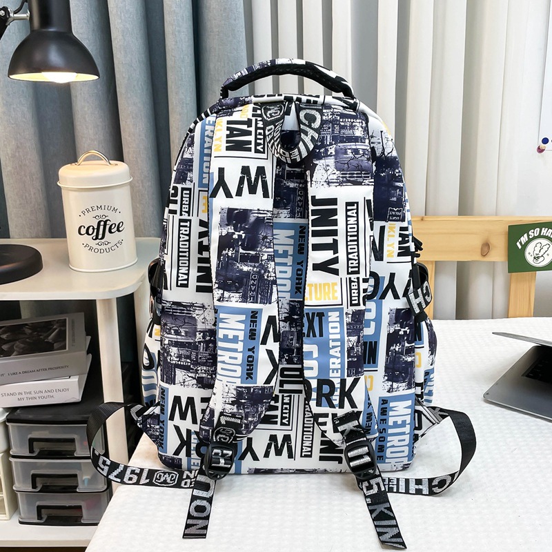 "Men's 2025 New style personalized graffiti middle school backpack, Japanese trendy brand college student couple travel backpack. Specification drawing