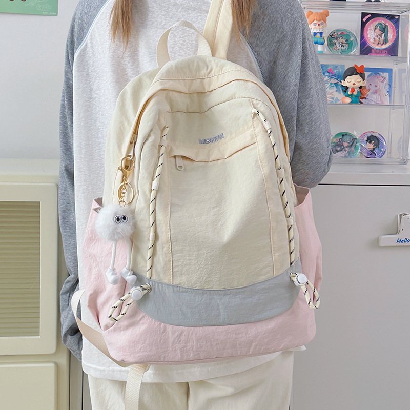 Lightweight, color-blocked backpacks for sports, large-capacity outdoor casual hiking bags, and simple schoolbags for college students' hiking trips full figure