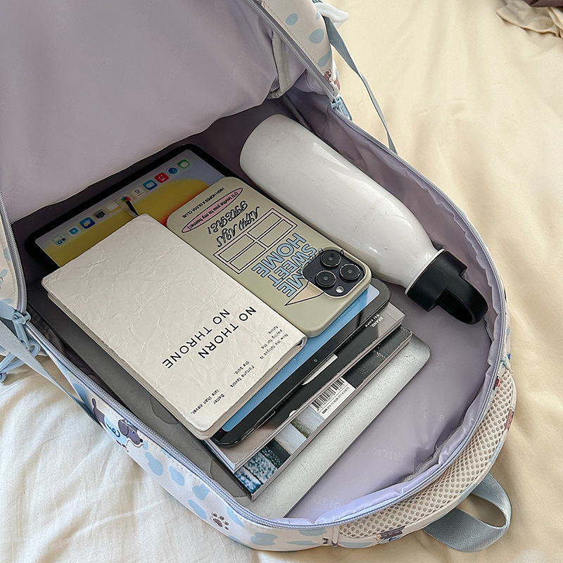 A new high-appearance-level Japanese ins fresh, sweet and cute dog backpack, a lightweight and large-capacity backpack for junior and senior high school students Application Scenario