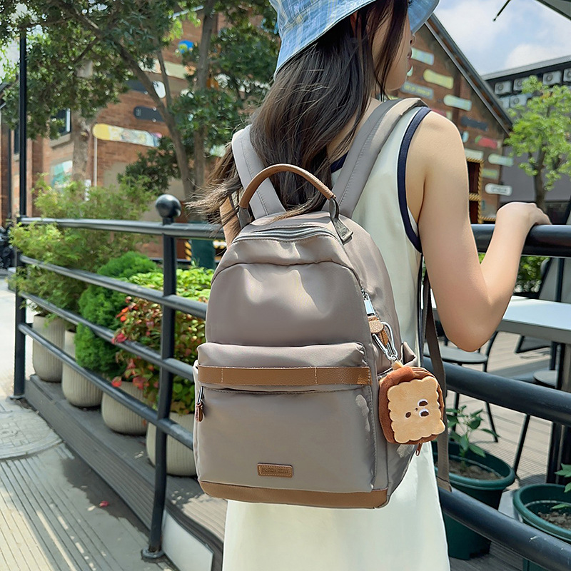A new high-appearance-level color-blocking backpack from Korean Instagram, a casual, simple, lightweight and large-capacity backpack for middle and high school students full figure