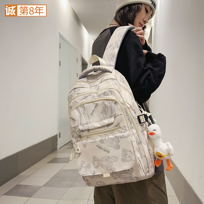 A schoolbag for girls with a high level of appearance, a simple bear backpack for primary and secondary school students, a Japanese-style Instagram casual college student travel bag full figure