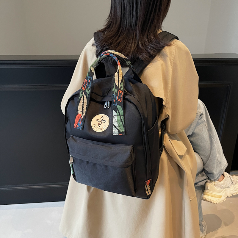 A large-capacity 2024 new casual backpack for junior and senior high school students, fashionable and versatile, trendy travel backpack details Picture