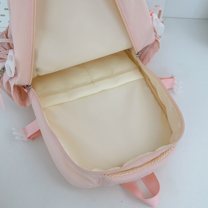 Japanese-style lightweight solid-color backpack, large-capacity outdoor travel backpack, casual and versatile college student commuting schoolbag Application Scenario