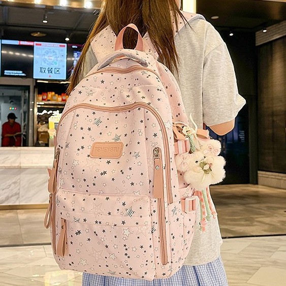 A new high-appearance-level, fresh and sweet star and moon backpack from Japanese Instagram, a casual and lightweight backpack for junior and senior high school students full figure