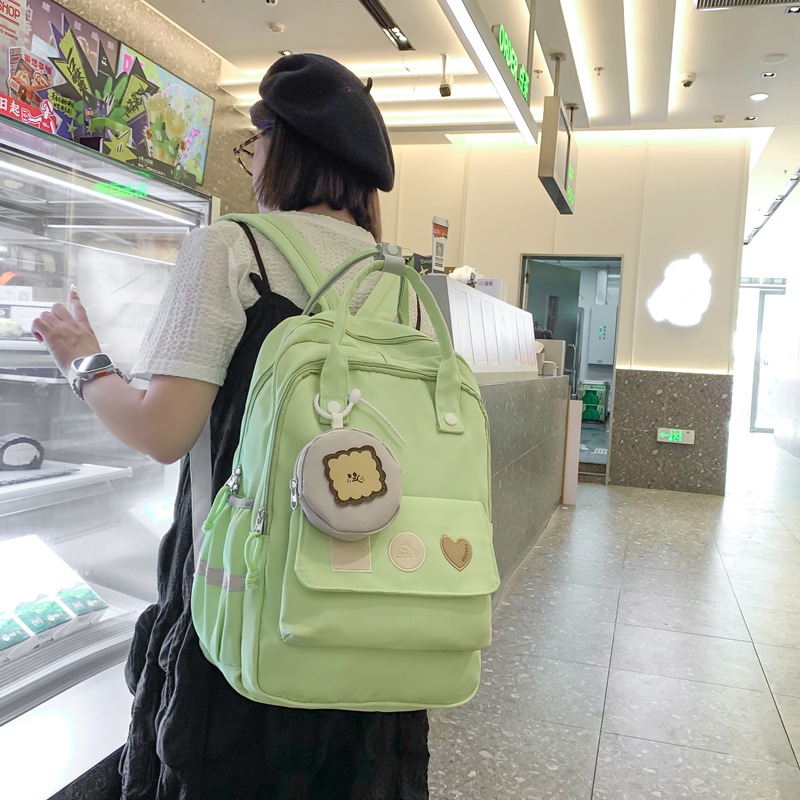 A new Japanese-style ins backpack with a high level of appearance and a fresh and sweet school style. It is a lightweight and large-capacity backpack for primary and secondary school students full figure