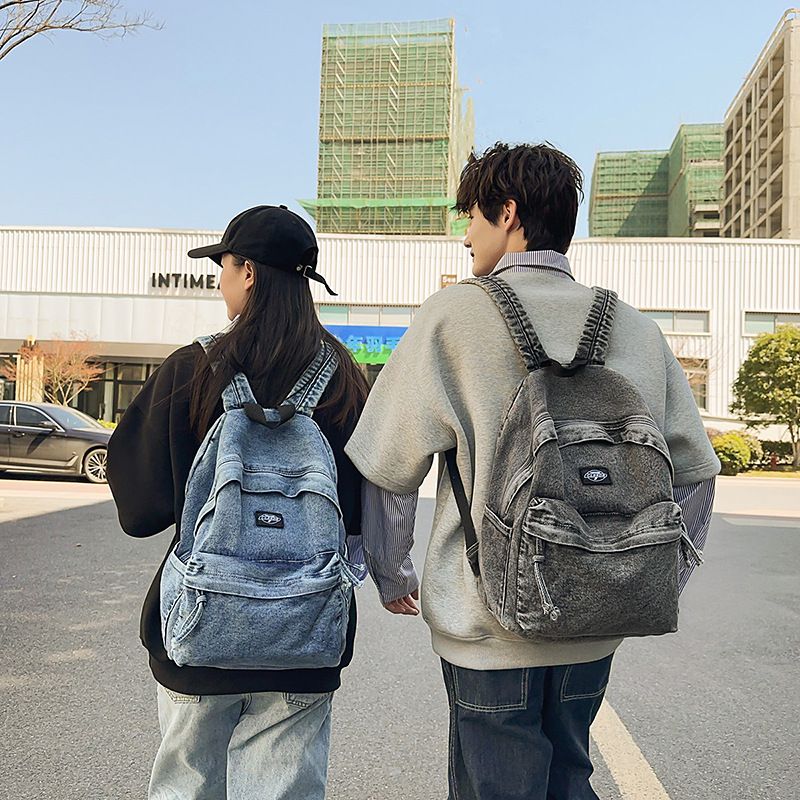 2025 New casual college style single-shoulder bag for couples, fashionable college student schoolbag, simple and lightweight denim backpack full figure