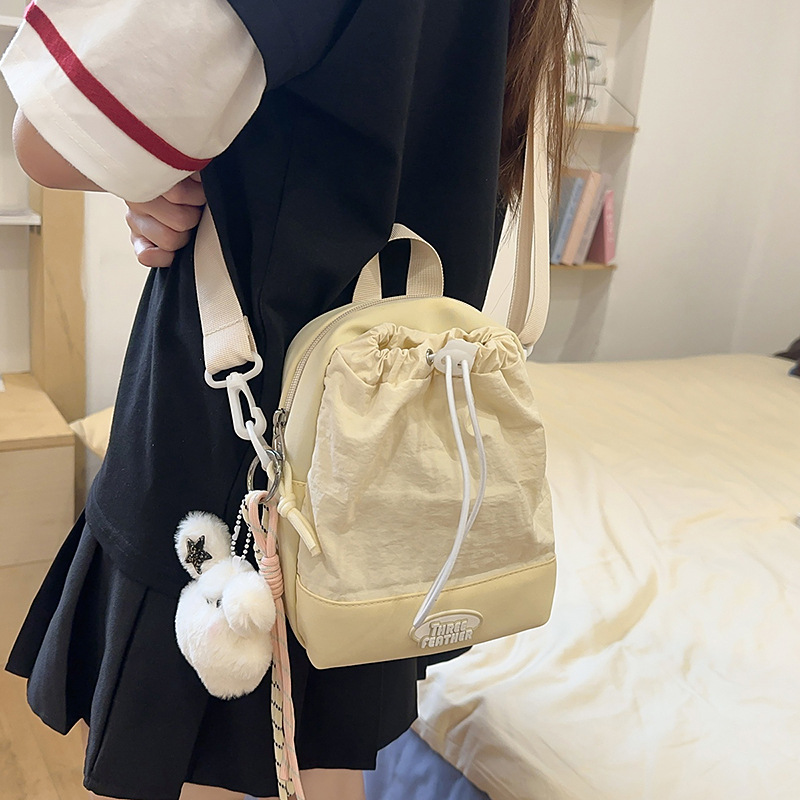 Simple, fashionable, high-end, versatile single-shoulder bag, fresh and light travel bag, casual, niche and sweet drawstring backpack details Picture