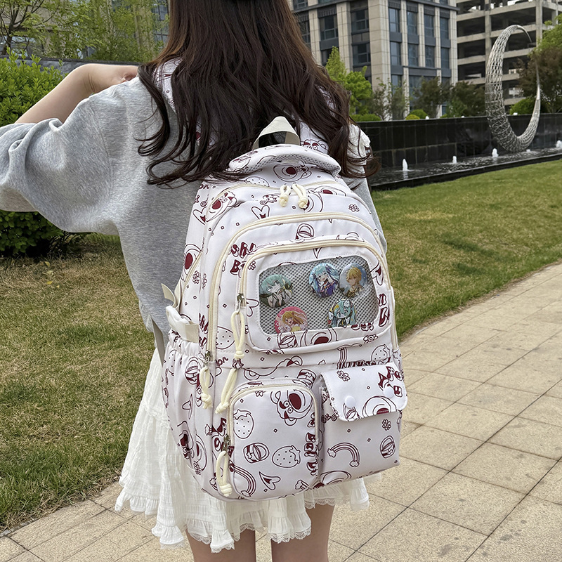 New high-appearance-level, fresh and clean schoolbag, Japanese Harajuku style, large-capacity travel backpack, printed and versatile backpack full figure
