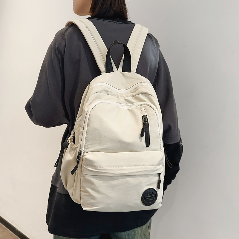 2024 New backpack for men, junior high school, senior high school and college students, large-capacity schoolbag, casual and versatile, outdoor lightweight backpack for women full figure
