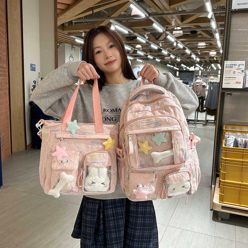 New schoolbag for junior high school girls, high appearance level, niche large-capacity backpack, sweet girl, cute, transparent pain relief bag, after-school tutoring bag full figure