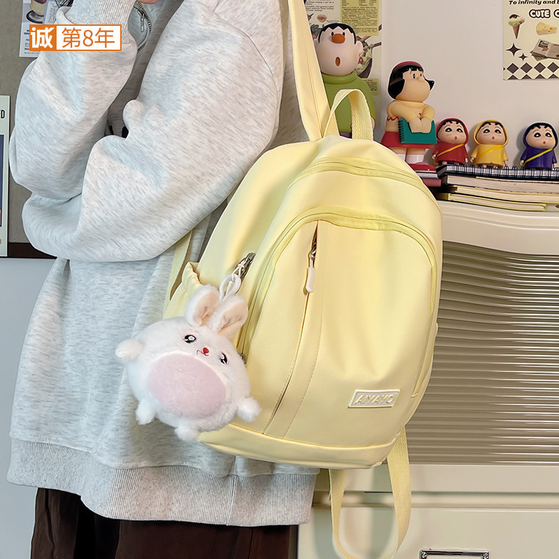 The new schoolbag is a simple solid-color small backpack for female college students. It features a Japanese Instagram style, a soft and cute girl, and mini shoulders full figure