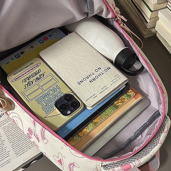 A new Korean-style Instagram backpack with a high level of appearance, fresh, sweet and cute cartoon letters, and a lightweight backpack for junior and senior high school students Application Scenario