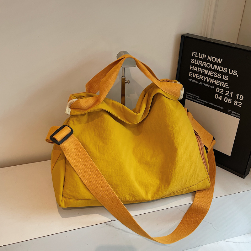 A new Korean-style ins tote bag with a high level of appearance, fresh and sweet, candy-colored, lightweight storage, and a crossbody bag for travel and shopping Specification drawing
