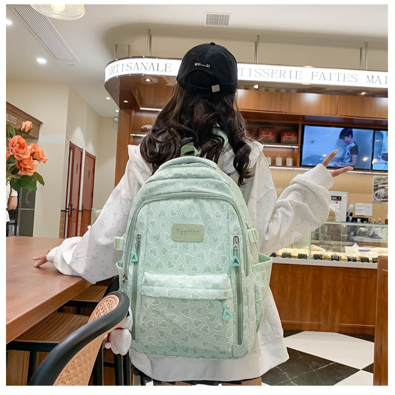 Fashionable and simple macaron-colored heart-shaped backpack, large-capacity cute girls' schoolbag, multi-functional student backpack details Picture