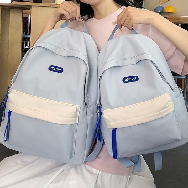 A new Japanese-style ins backpack with a high level of appearance, fresh and sweet color contrast, is a lightweight multi-pocket backpack for primary and secondary school students details Picture