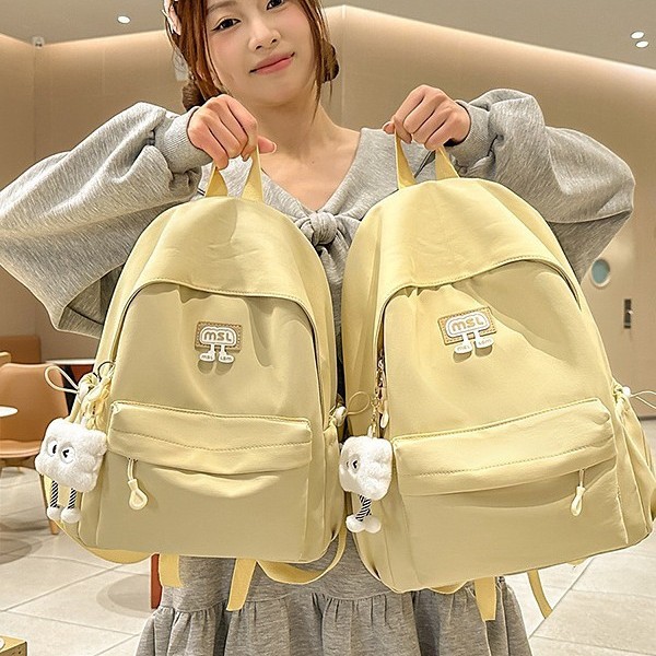 The 2025 new style of fresh and cute girl backpack is a large-capacity outdoor casual backpack for junior and senior high school students with a high appearance level details Picture