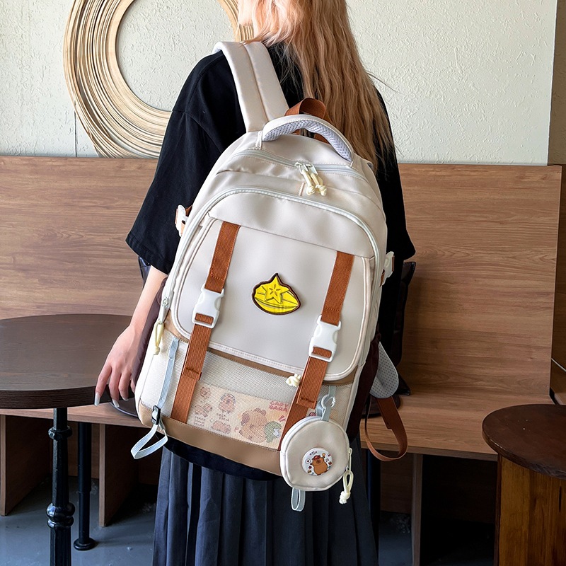 The new Korean version of the ins high-appeartion-level college style color-blocking and patchwork backpack is a large-capacity backpack for students in grades 1-3 details Picture
