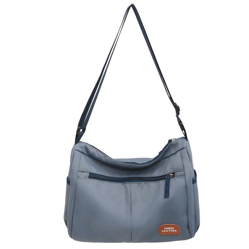 Commuter messenger bag, men's casual trendy crossbody bag, student class backpack, women's lightweight sports travel single-shoulder bag Item Picture