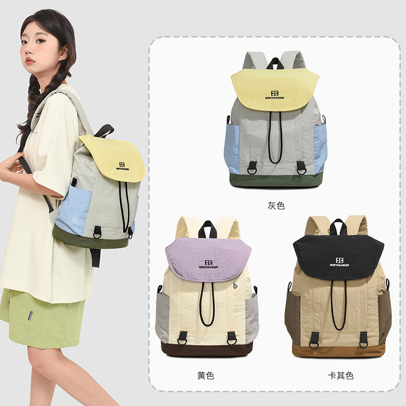 The 2025 new color-blocking backpack is a lightweight, casual and versatile backpack for junior and senior high school students as a couple. It is also suitable for traveling full figure